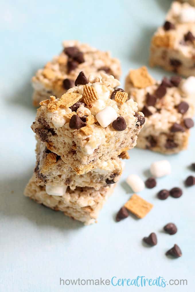 stacked s'mores rice krispie treats with blue background 