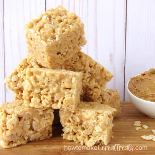 peanut butter rice krispie treats and a bowl of creamy peanut butter