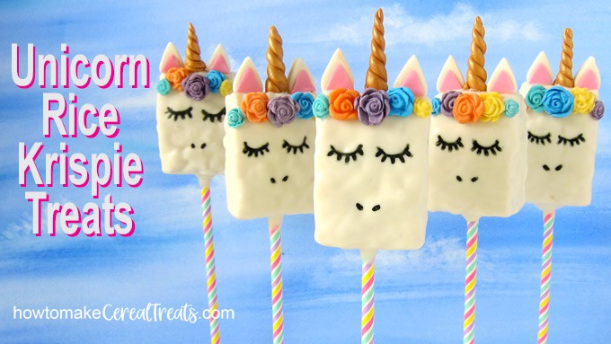 five rice crispy treat unicorn lollipops set in front of a blue sky background with text overlay