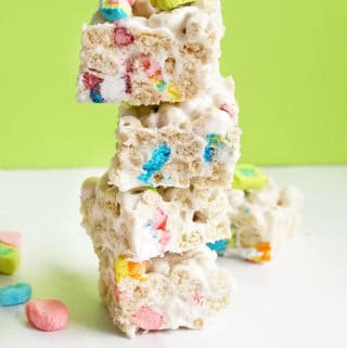 stacked lucky charms treats with green background