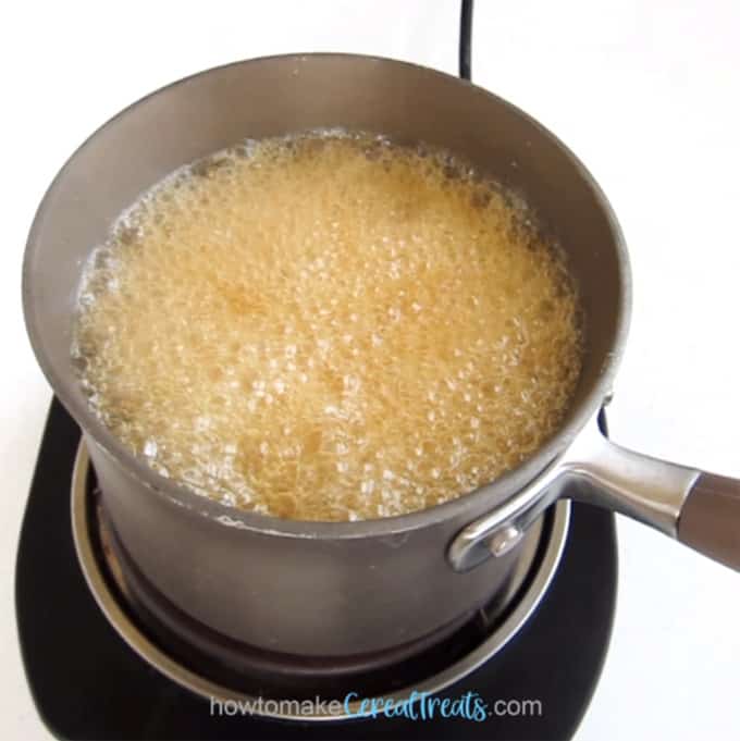 boiling honey to make peanut butter rice krispie treats