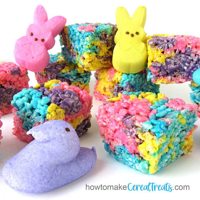Pink, blue, purple, and yellow Peeps are used to make Peeps Rice Krispie Treats for Easter.