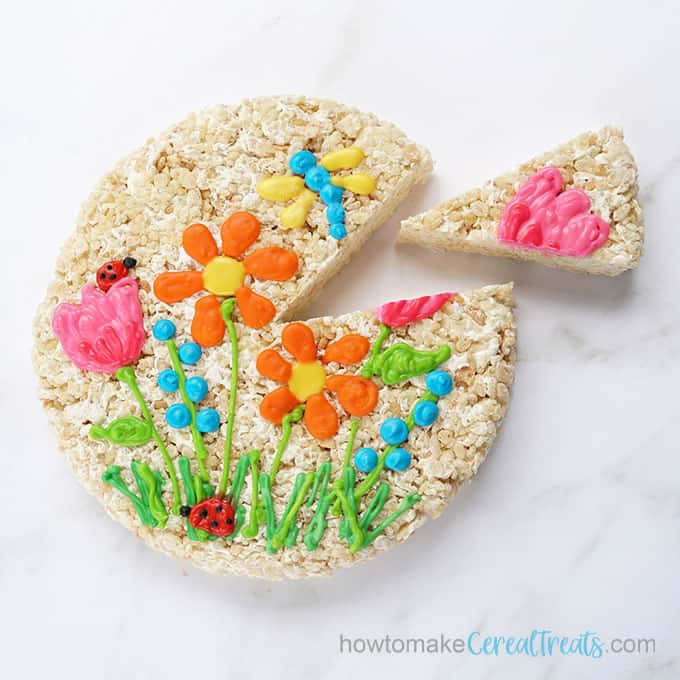 SPRING Rice Krispie Treat cake decorated with royal icing flowers. Great for spring, Mother's Day, Easter. 