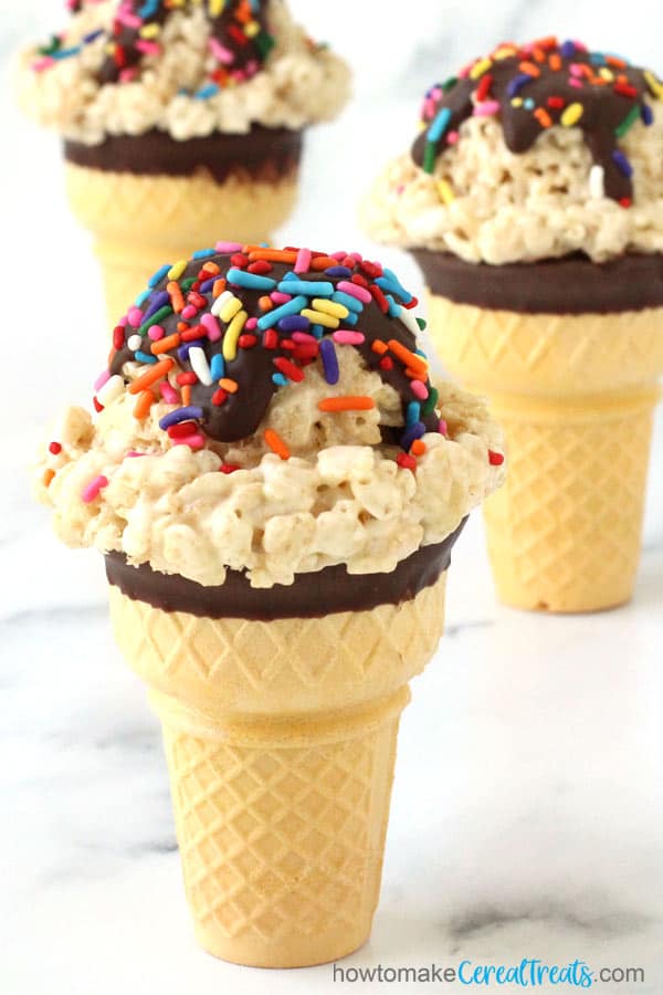 top a rice krispie treat ice cream cone with chocolate and sprinkles