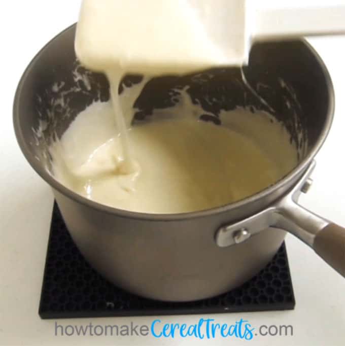 melting marshmallows and butter in a saucepan