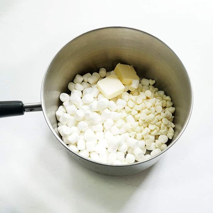 ingredients for neapolitan rice krispie treats in saucepan 