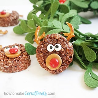 Chocolate REINDEER RICE KRISPIE TREATS are a cute, easy Christmas fun food idea. Kids can help decorate this no-bake dessert.