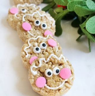 gingerbread Rice Krispie treats decorated as gingerbread man cookies for Christmas
