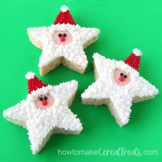 Rice Krispie treat Santa Claus star-shaped cereal treats decorated with frosting and sugar pearls