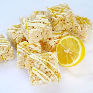 lemon Rice Krispie Treats with icing and lemon zest