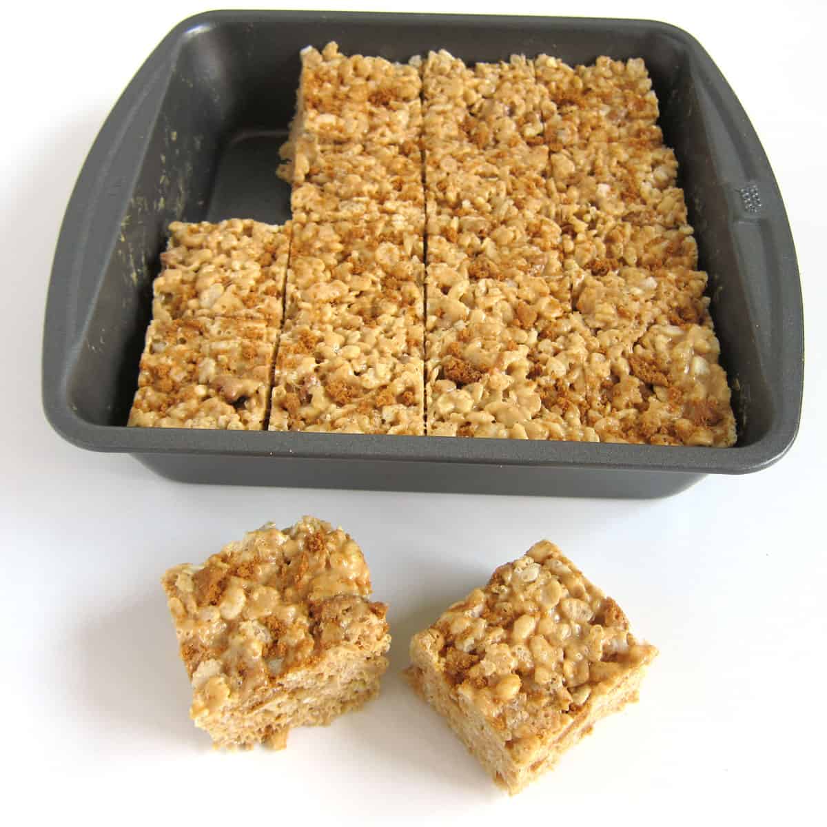 8-inch square pan filled with Biscoff Rice Krispie Bars