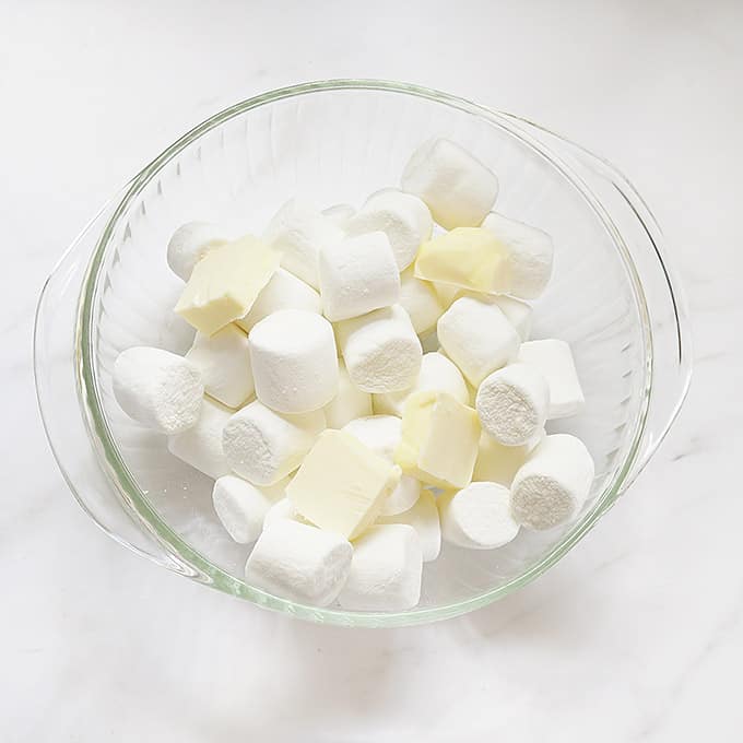 bowl of marshmallows and butter for lemon Rice Krispie treats