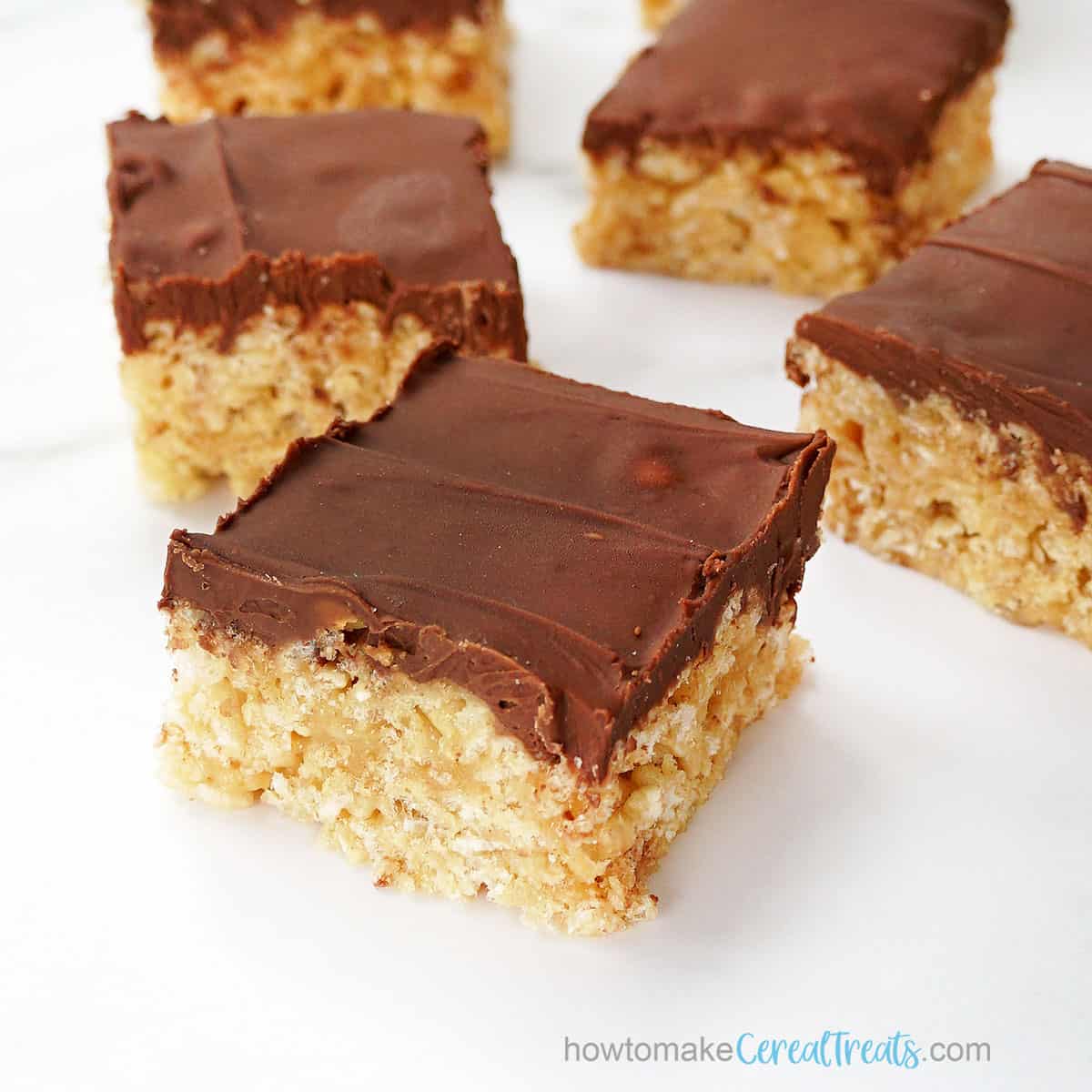 scotcheroos treats with chocolate butterscotch topping