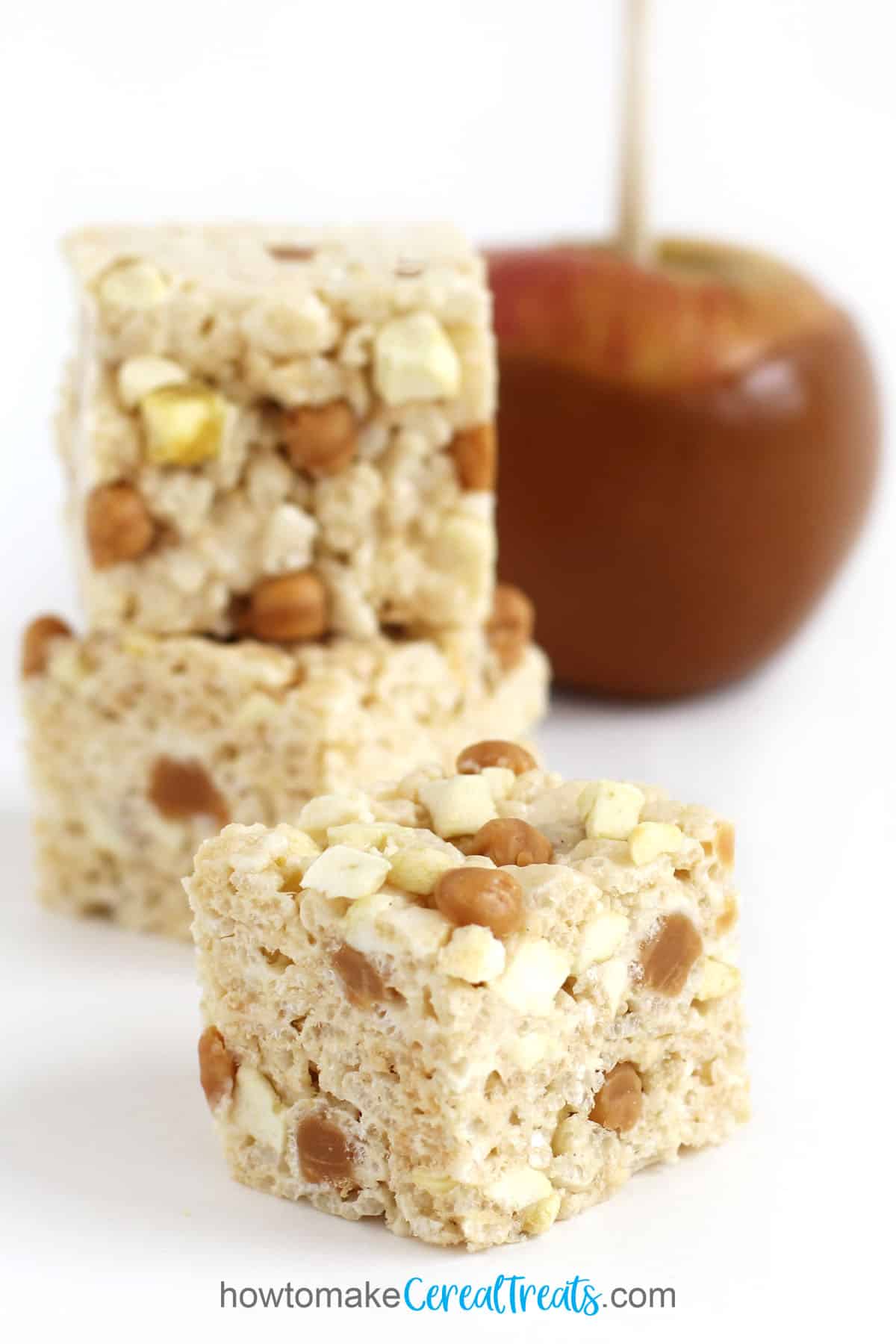 Caramel Apple Rice Krispie Treats filled with chopped apple rings, crushed freeze-dried apples, and caramel bits. 