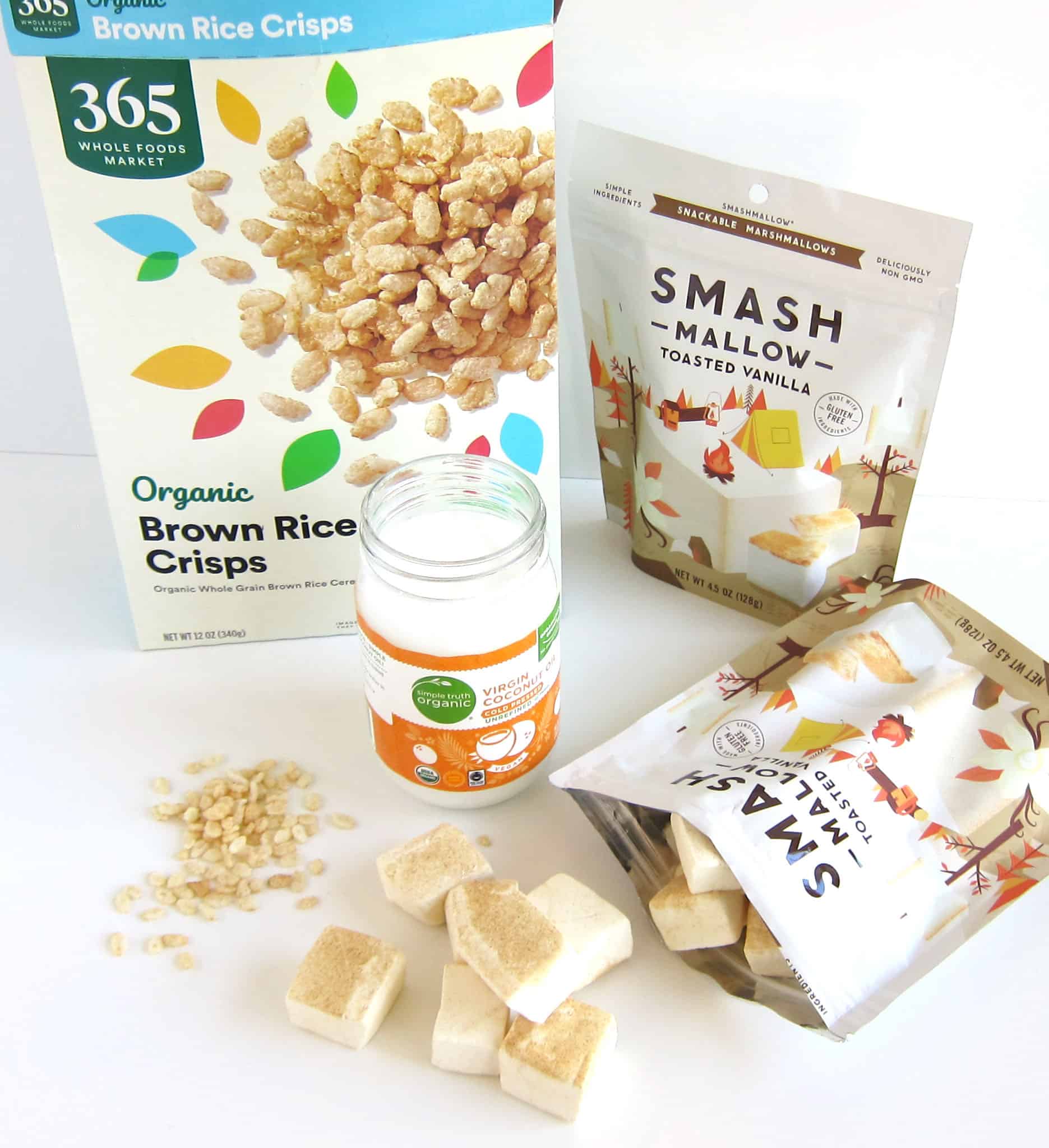 Ingredients used to make healthy Rice Krispie treats including organic brown rice crispies cereal, Smashmallows, and coconut oil. 