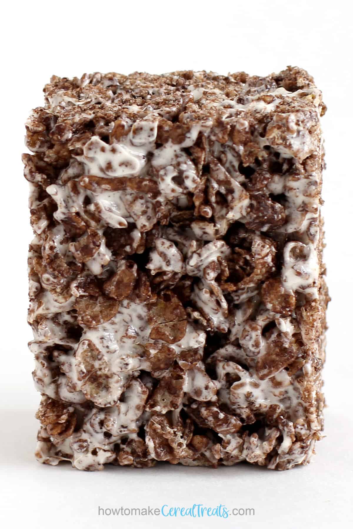 one Cocoa Pebbles treat cut into a rectangle