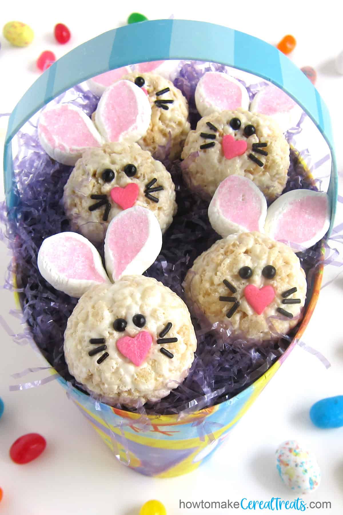 Rice Krispie Treat Bunnies in an Easter basket with Easter candy