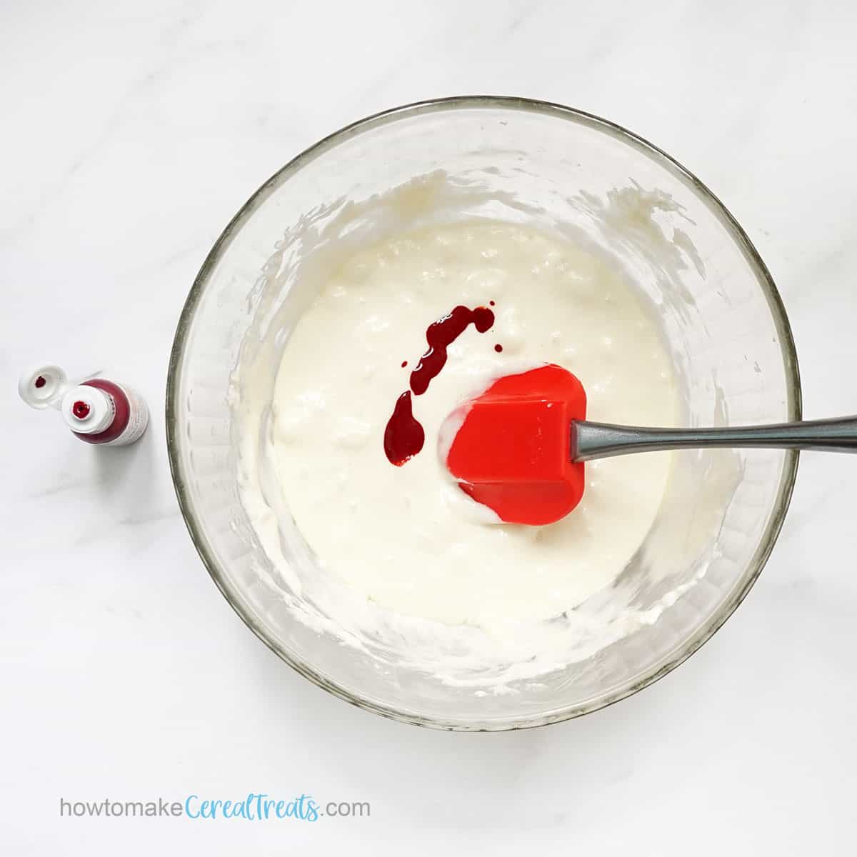 red food coloring in marshmallow mixture to make cereal treats