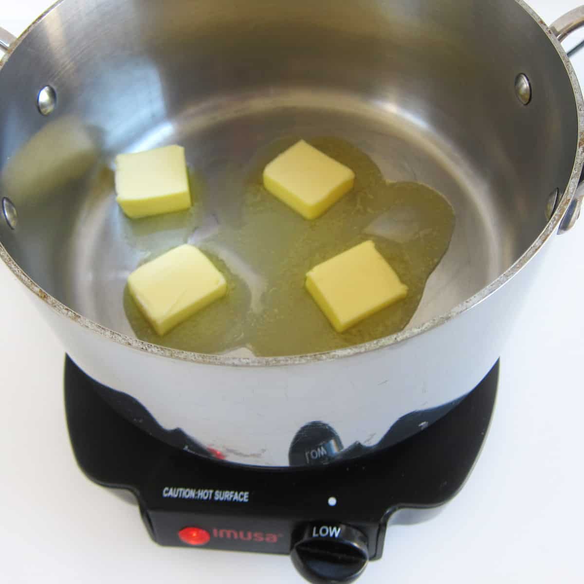 melting butter in saucepan on low heat