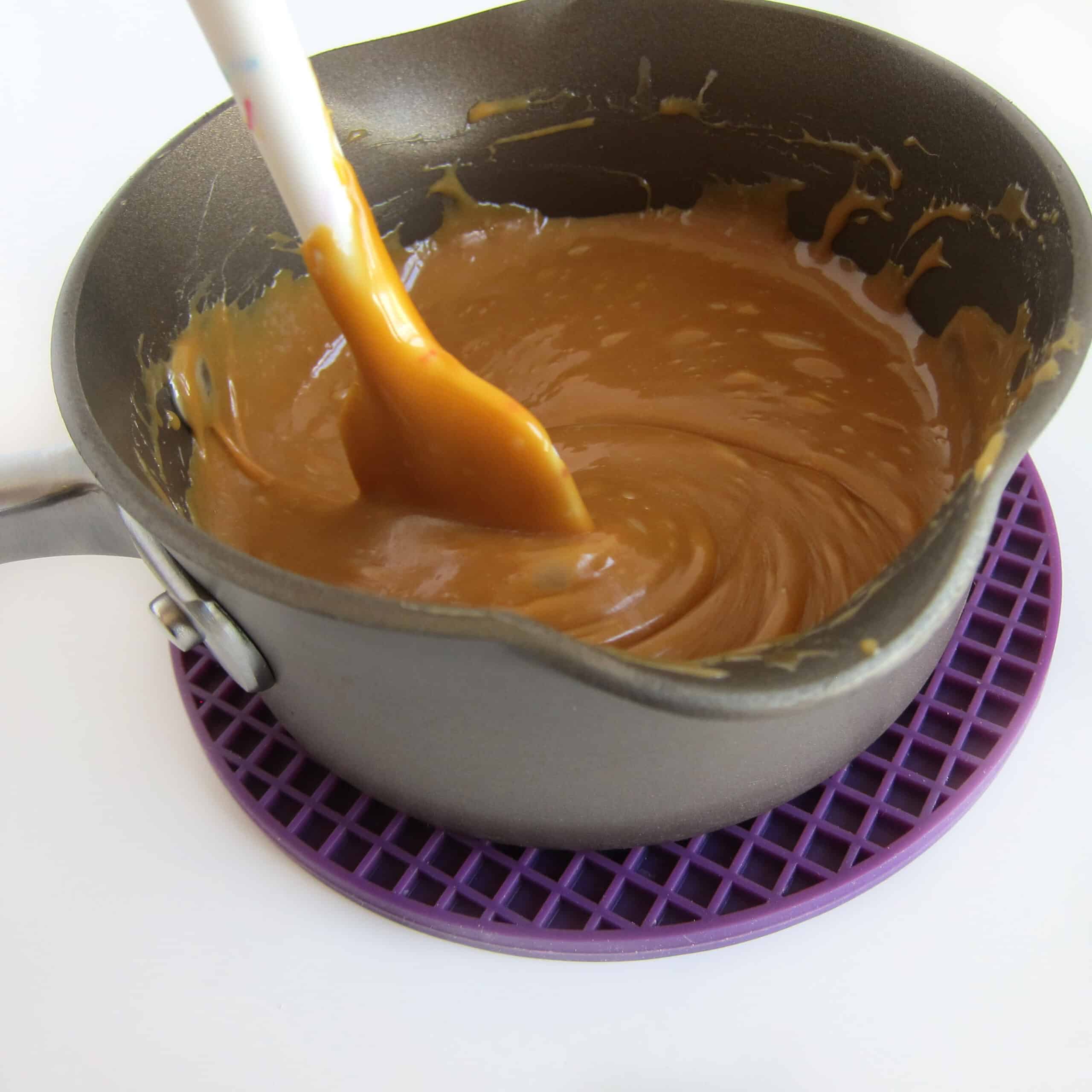 stirring melted caramel