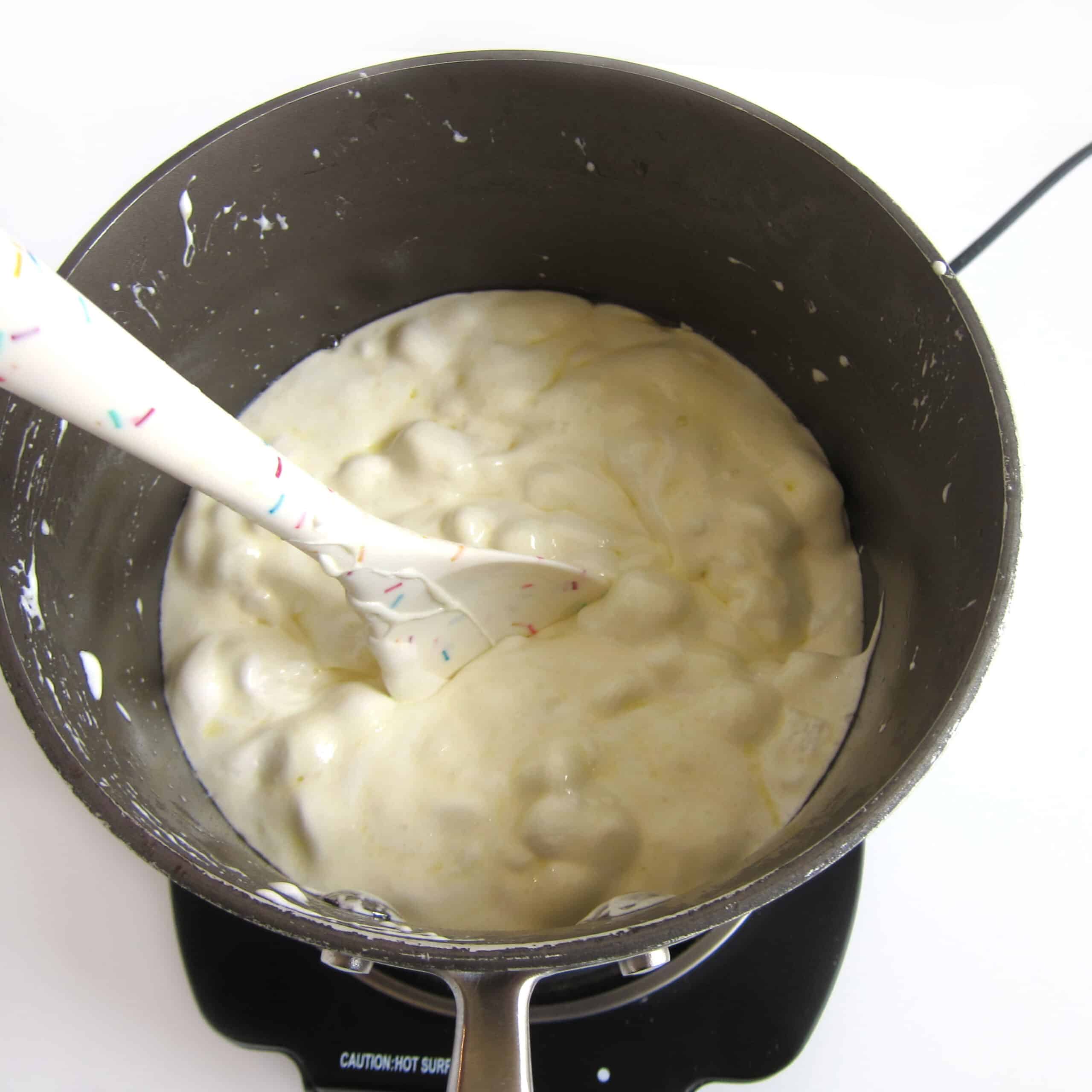 marshmallows and butter melting in saucepan
