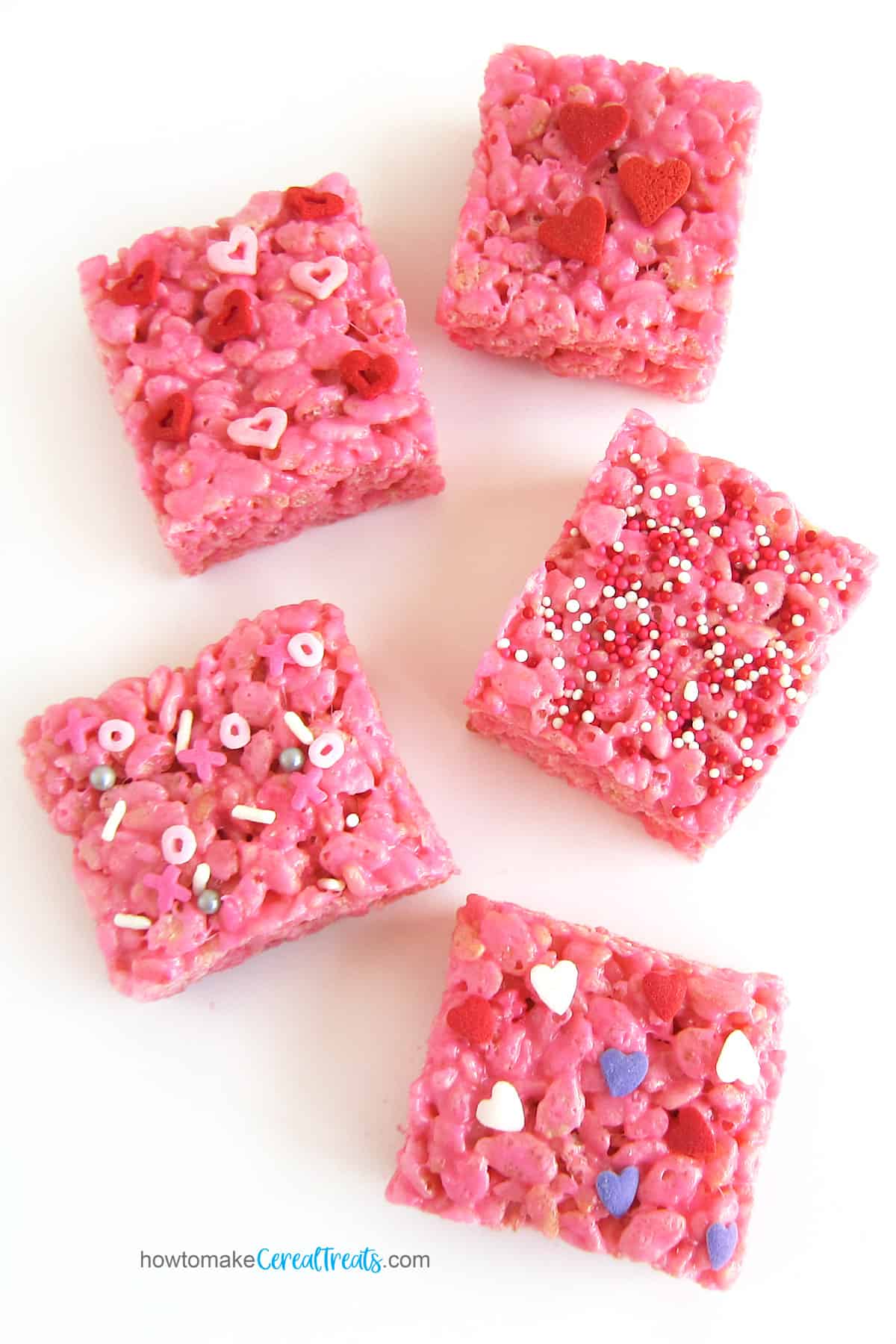 pink Rice Krispie Treats topped with Valentine's Day sprinkles