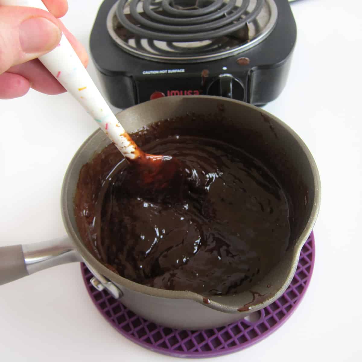 take chocolate ganache off the heat when 75% of the chocolate has melted