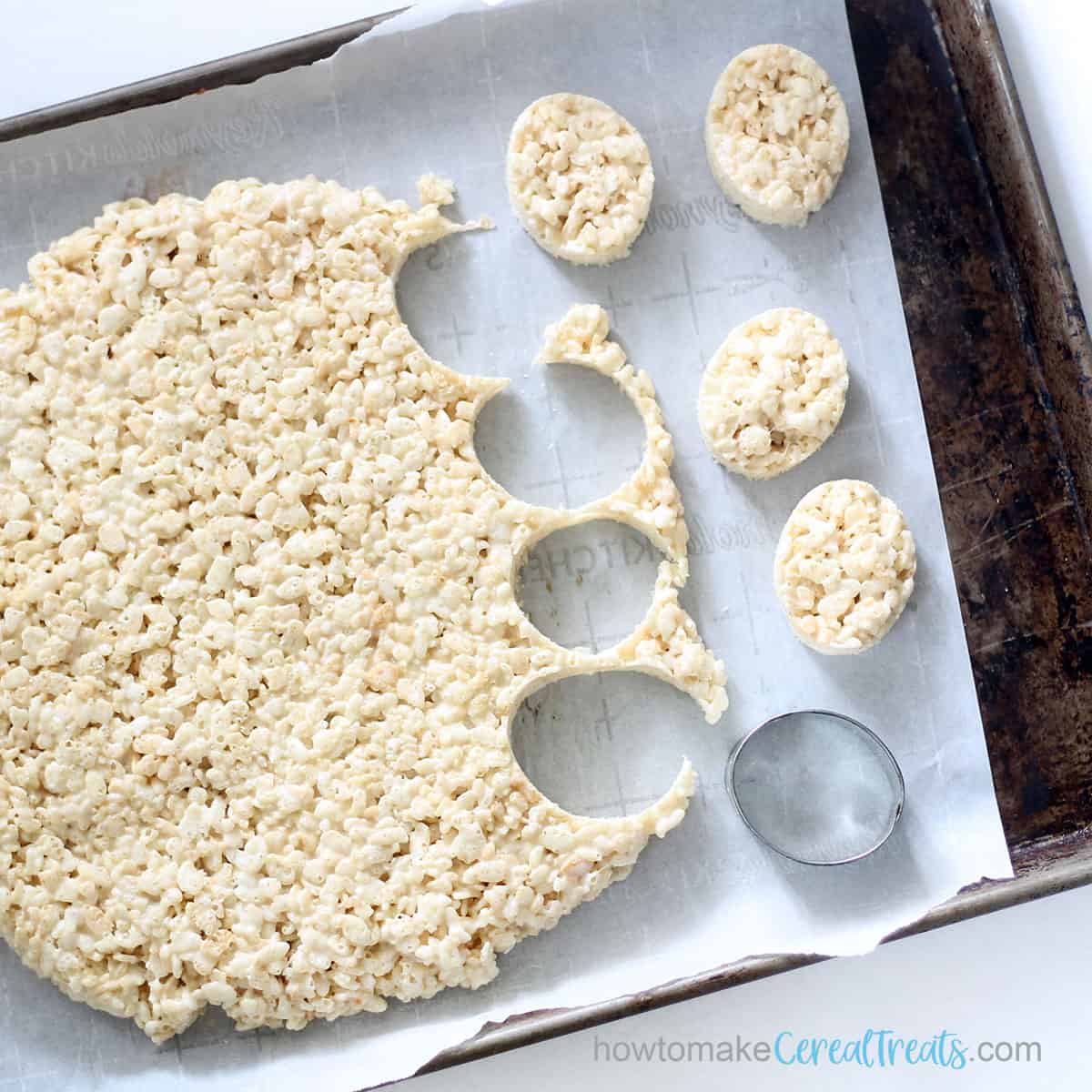 Oval cookie cutter and cutting out rice krispie treats