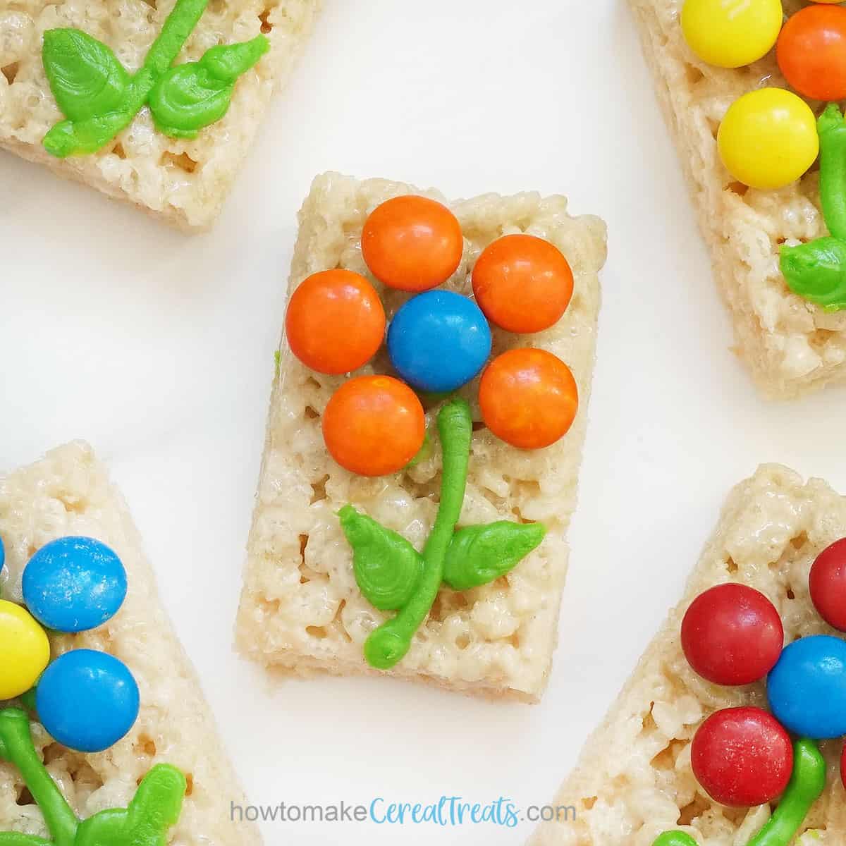 Rice Crispy Treats with M and M flowers and icing.