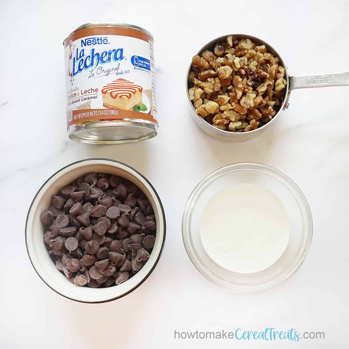 can of dulce de leche, chocolate chips, heavy cream, chopped walnuts or pecans
