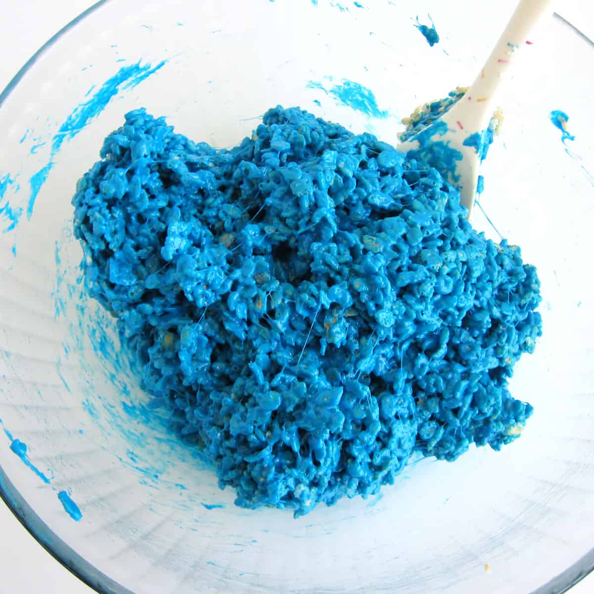 mixing blue rice crispy treats