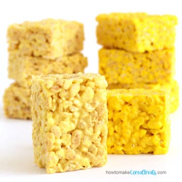 a stack of light yellow Rice Krispie Treats next to a stack of bright yellow Rice Krispie Treats