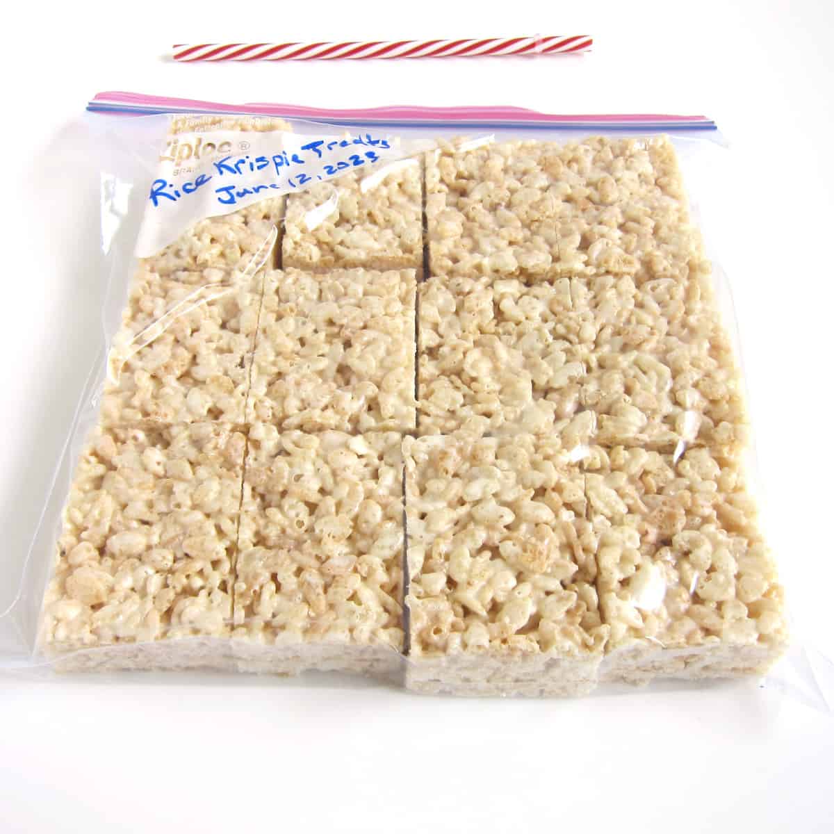 Rice Krispie Treats in a Zip-lock bag with the date written on the bag and a straw to remove air.