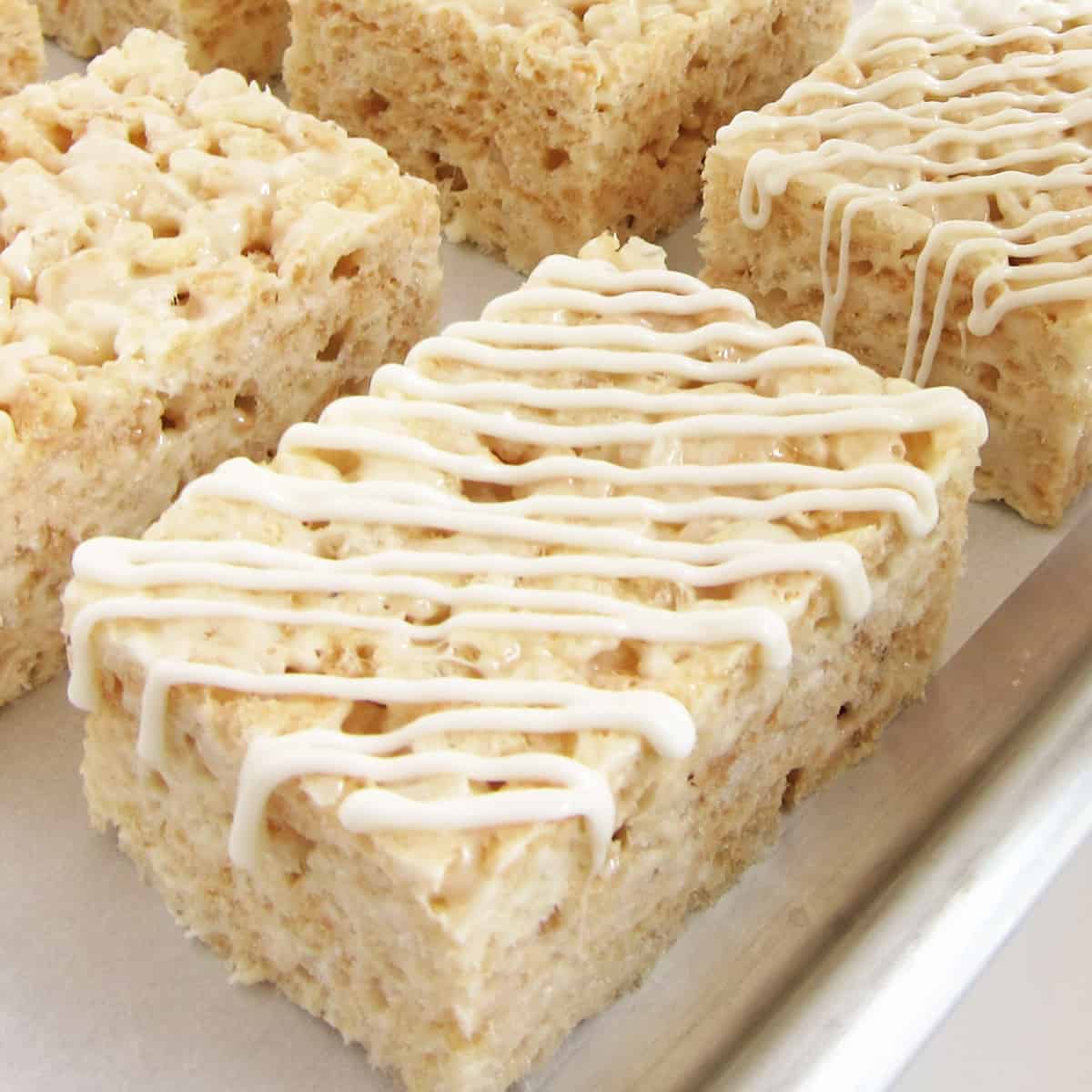 Rice Krispie Treat drizzled with white chocolate. 