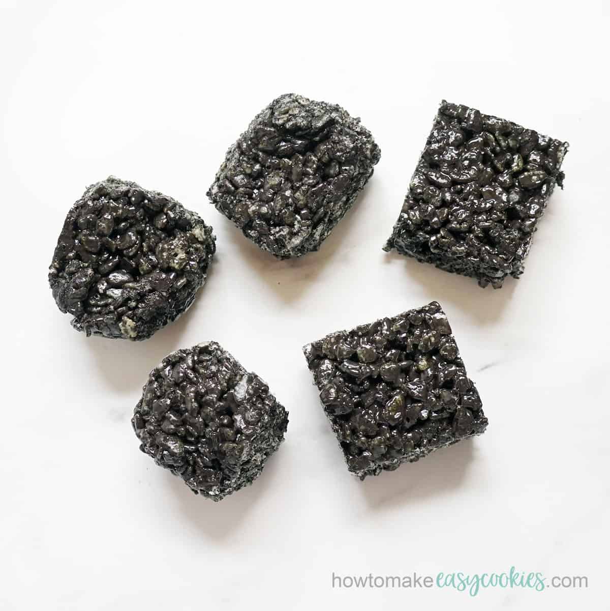 shaping black rice krispie treats into coal