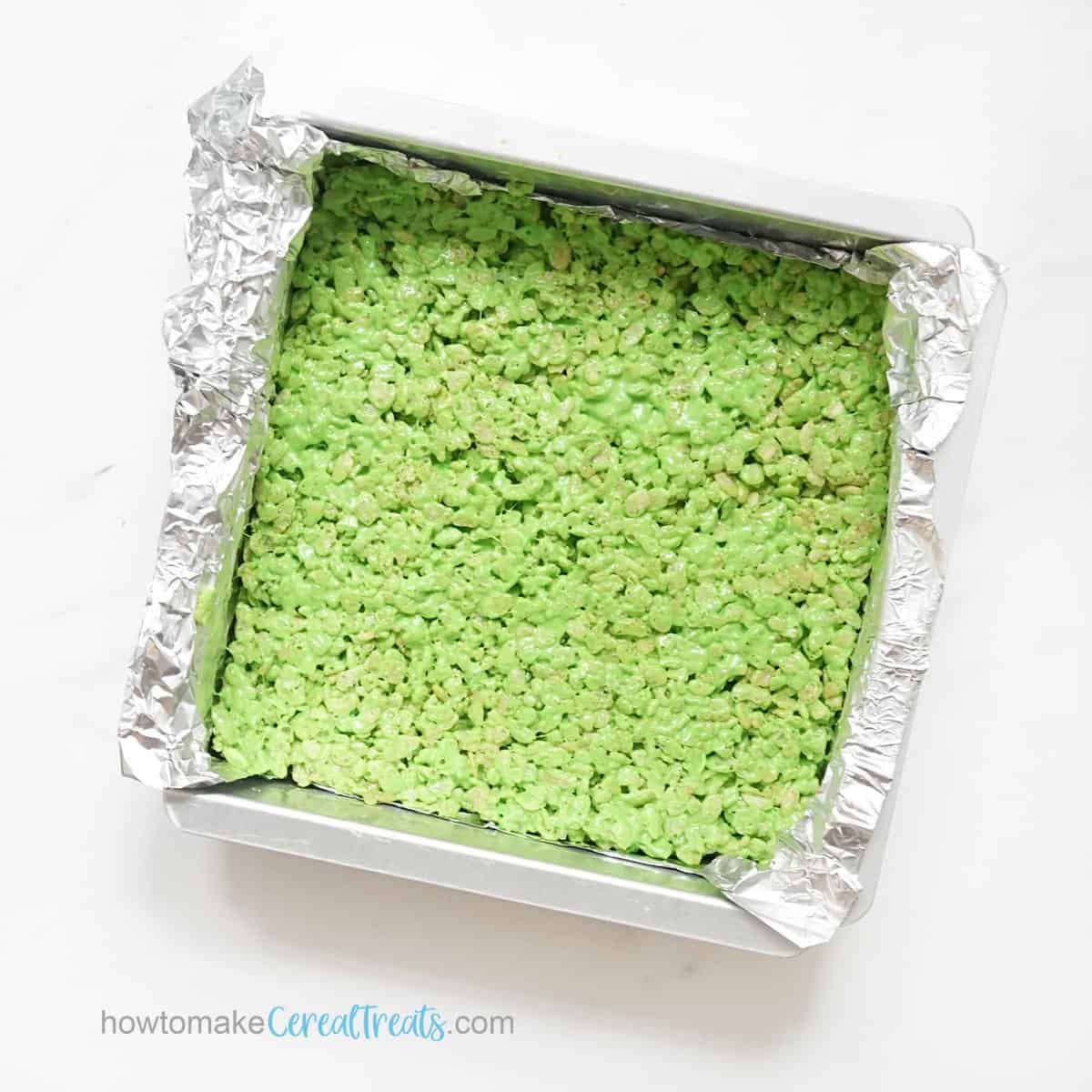 green rice krispie treats in baking pan