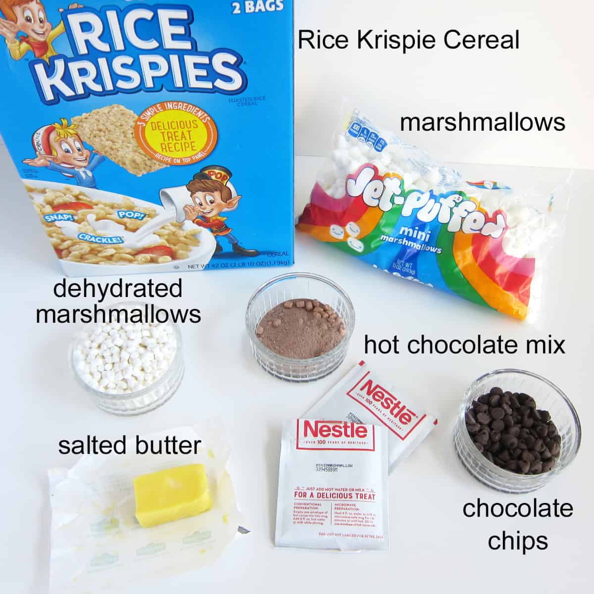 hot chocolate Rice Krispie treats recipe ingredients including Rice Krispies Cereal, marshmallows, hot cocoa mix, chocolate chips, salted butter, and dehydrated marshmallows.