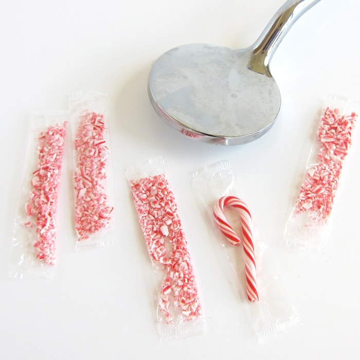 crushing mini candy canes into fine crumbs.