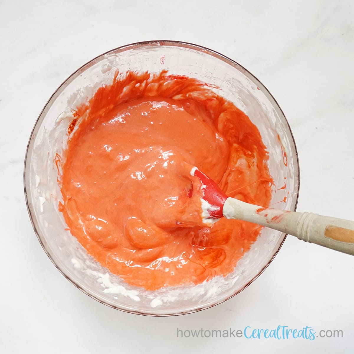 Red marshmallow mixture for Rice Krispie Treats