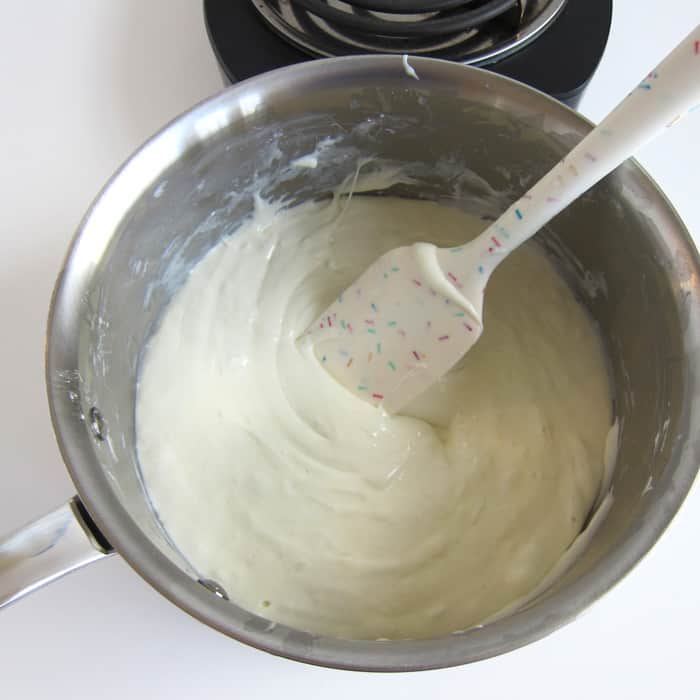 melted marshmallows, butter, and white candy melts stirred until creamy.