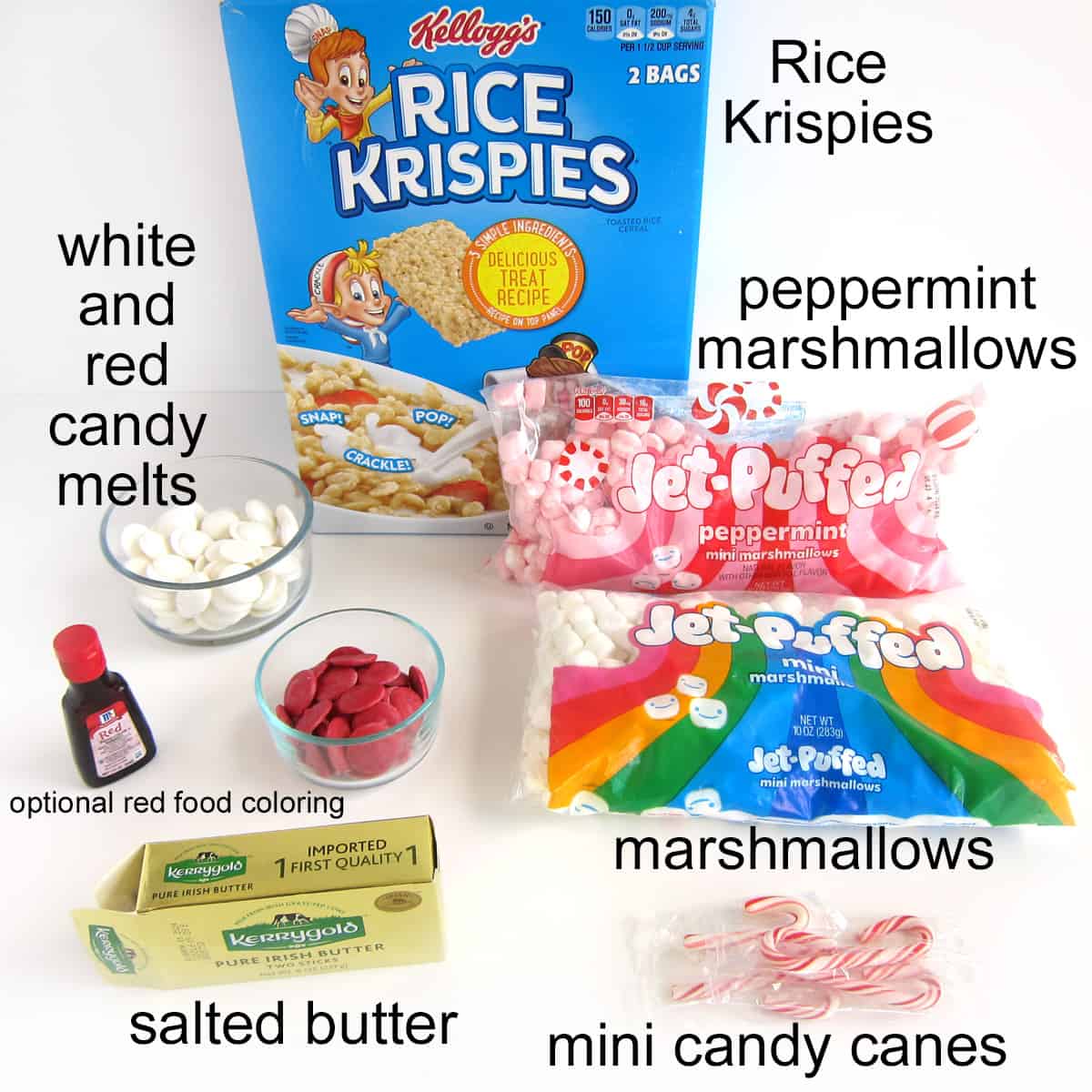 Rice Krispie treat candy cane ingredients including Rice Krispies, peppermint and regular marshmallows, mini candy canes, butter, red and white candy melts, and red food coloring.