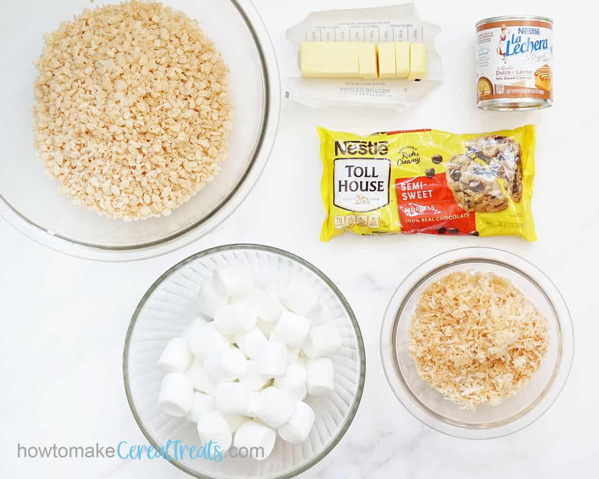 Samoa Rice Krispie Treat ingredients: Rice Krispies cereal, chocolate chips, dulce de leche caramel, toasted coconut, marshmallows, butter